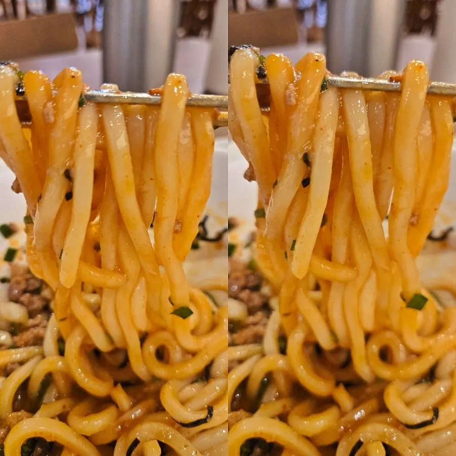 Mazesoba udon noodles mixed with the burst egg yolk