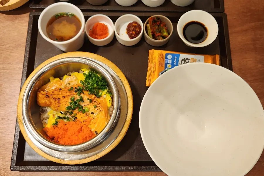 Salmon soboru sotbap topped with salmon, egg soboru, and flying fish roe