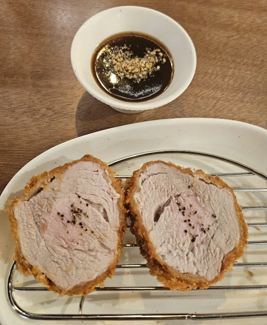 Two pieces of hire katsu ordered as a side dish