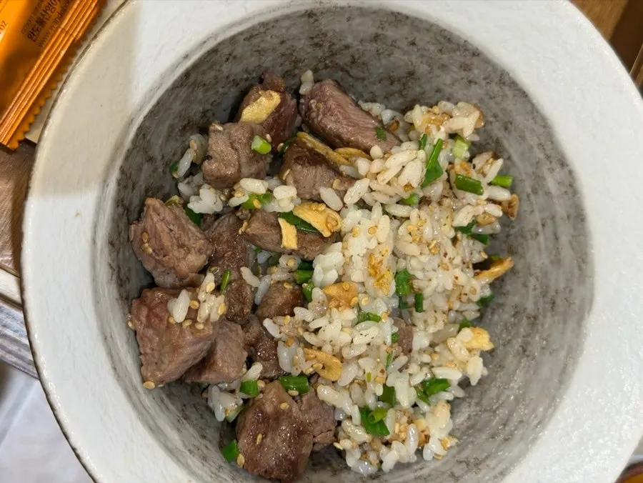 Table with steak pot rice and tonkatsu