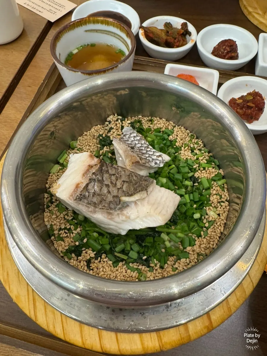 Two pot rice dishes with side dishes
