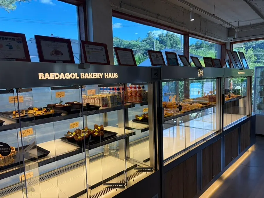 1st floor interior of Baedagol Bakery House with bread on display