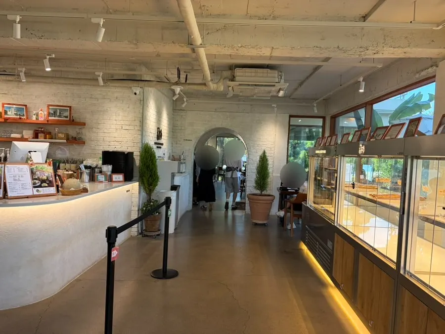1st floor forest-view seating with wooden tables