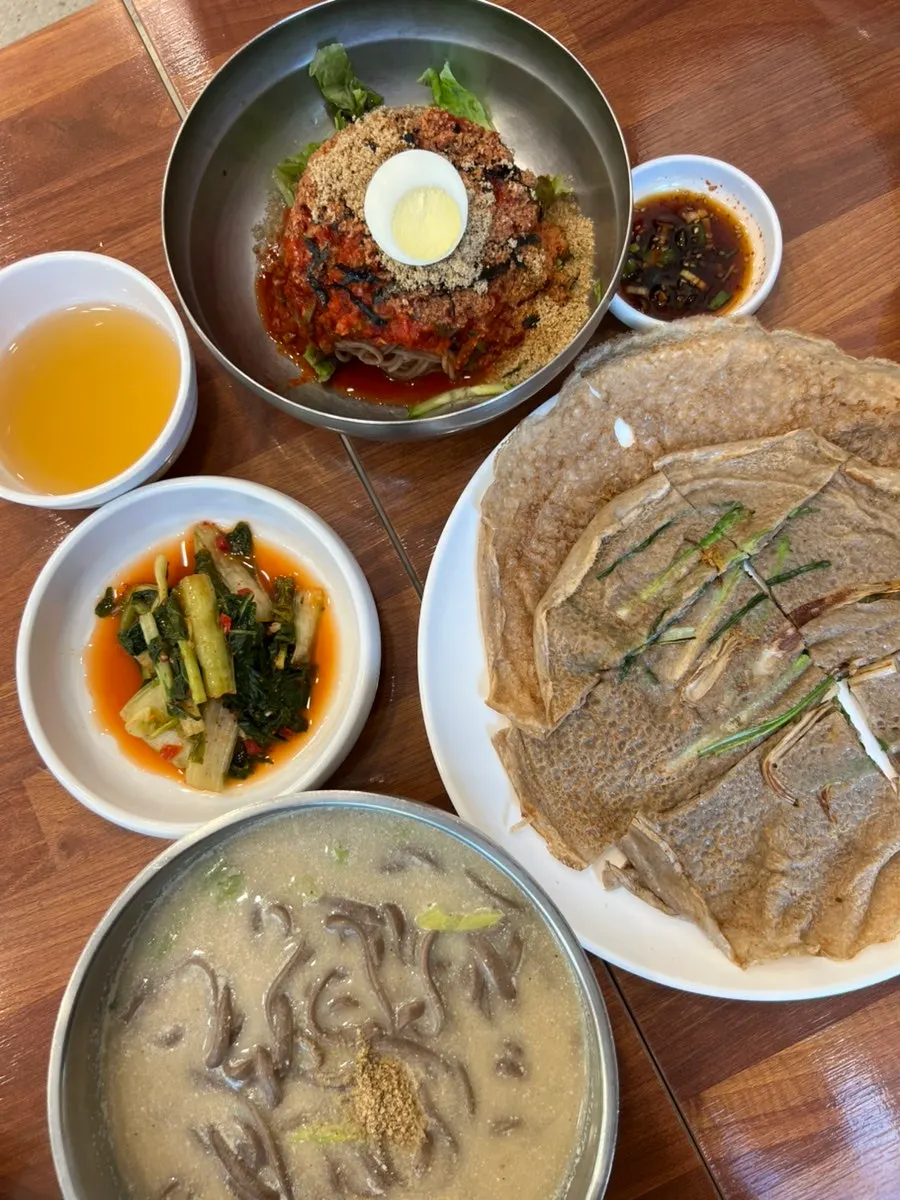 A full spread of ordered buckwheat dishes