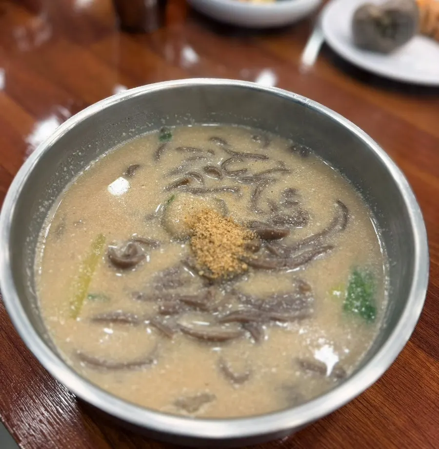 A steaming bowl of perilla buckwheat kalguksu