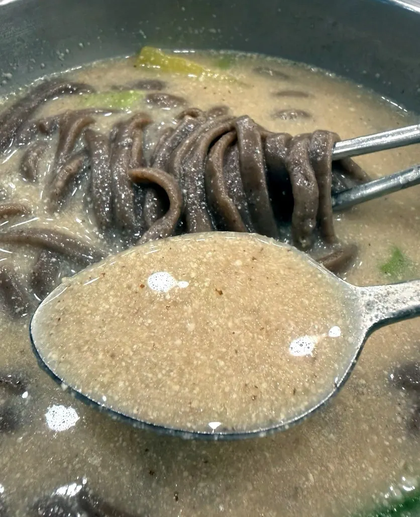 A spoonful of thick perilla broth