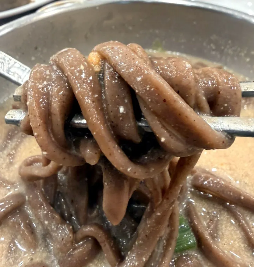 Zucchini and buckwheat noodles mixed into the perilla broth