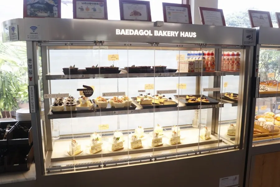 Private second-floor room with a window seat at Baedagol Bakery House