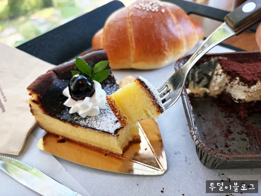 Tiramisu topped with soft cream