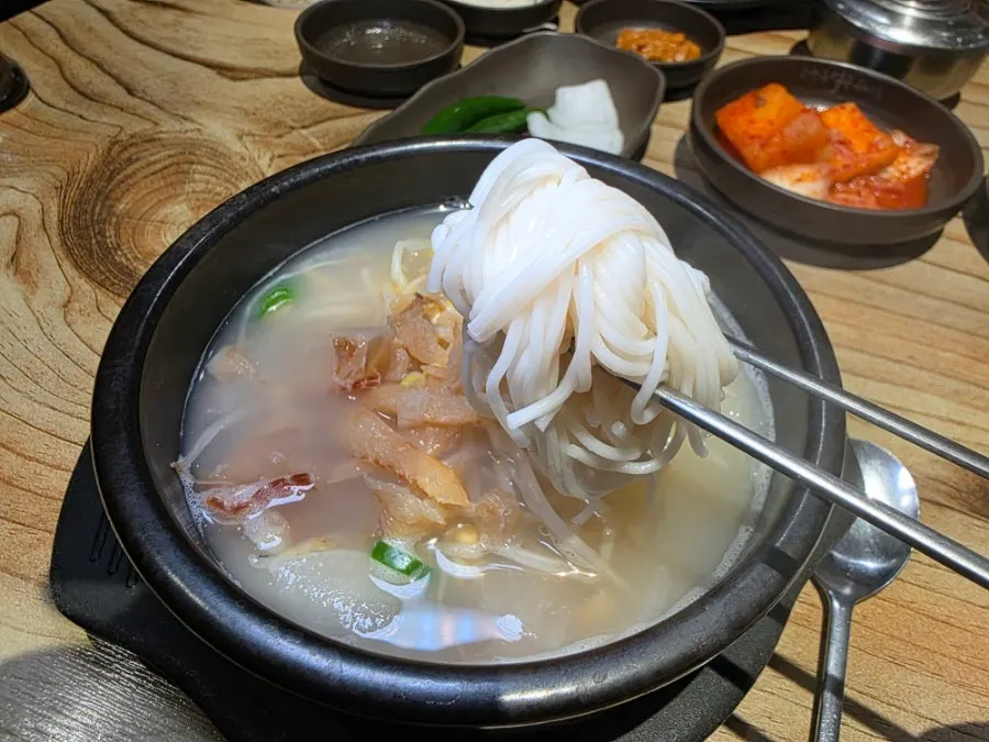 Table setting with dried pollack hangover soup and somyeon