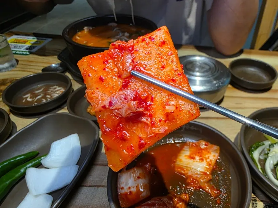 Meal setting with hangover soup and kimchi
