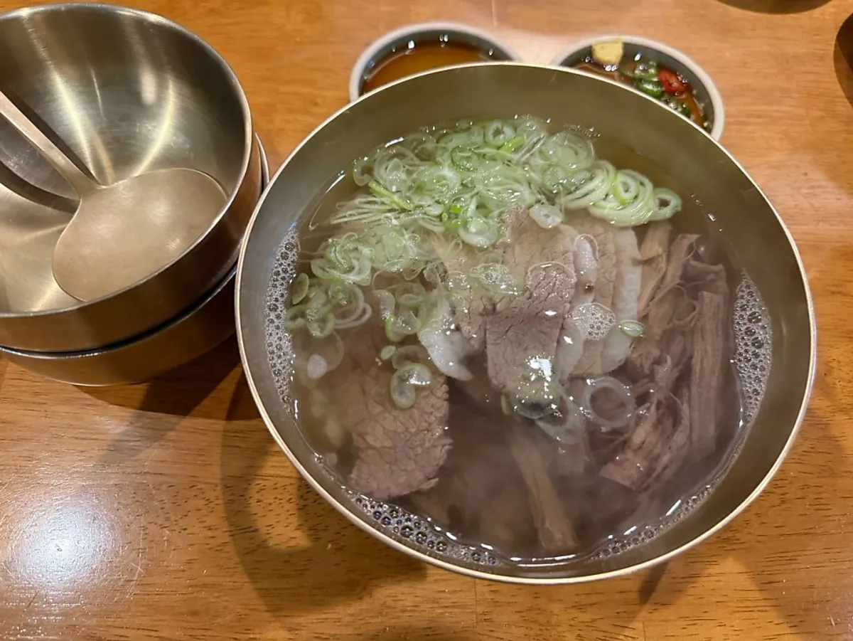 Doonjeong's clear beef gomtang and yukhoe bibimbap table setting
