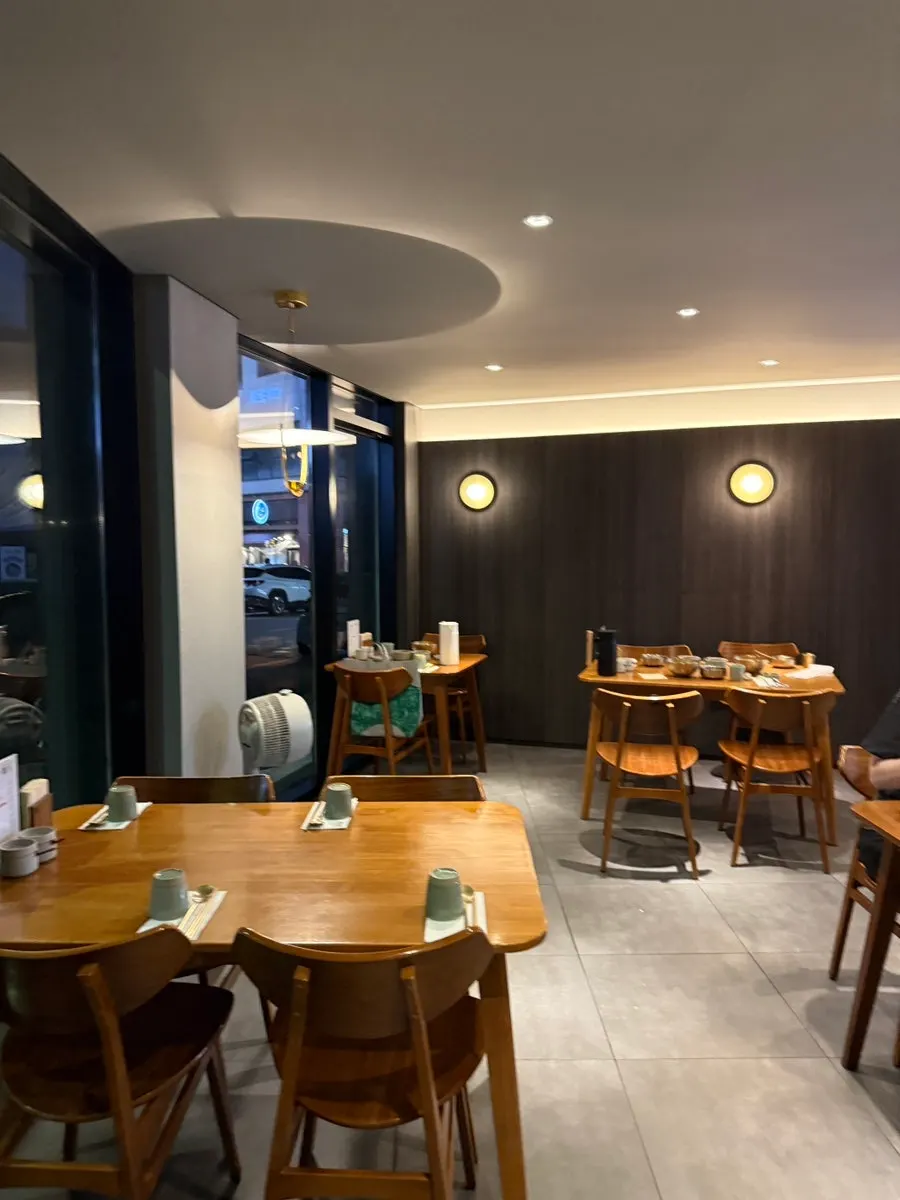 Doonjeong's wood-and-white exterior