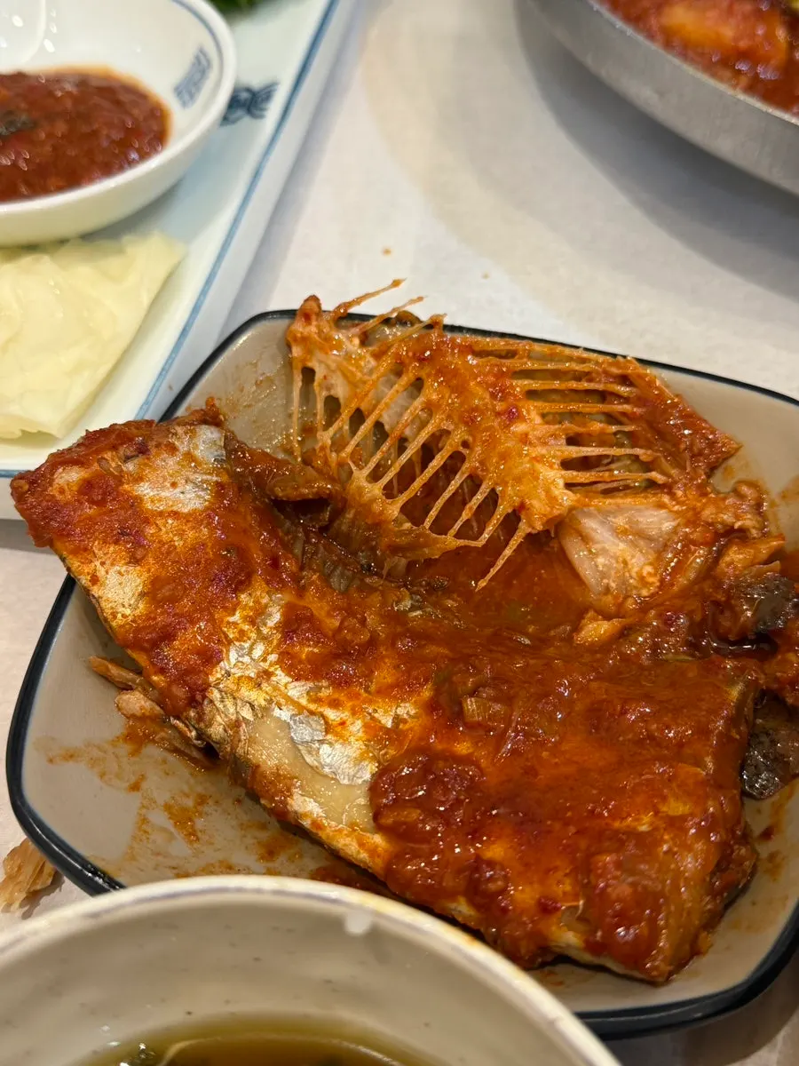 Braised Spanish mackerel flesh with sauce soaked in