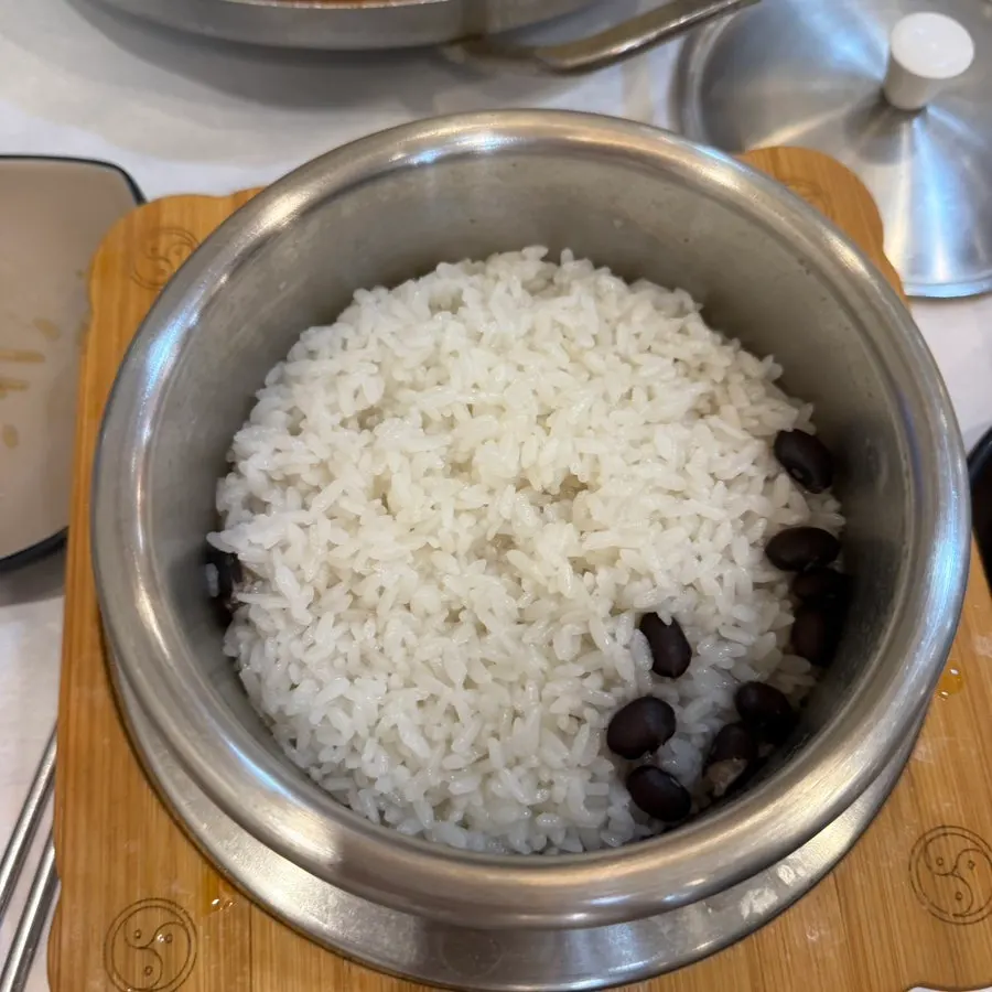 Table spread served alongside the braised fish