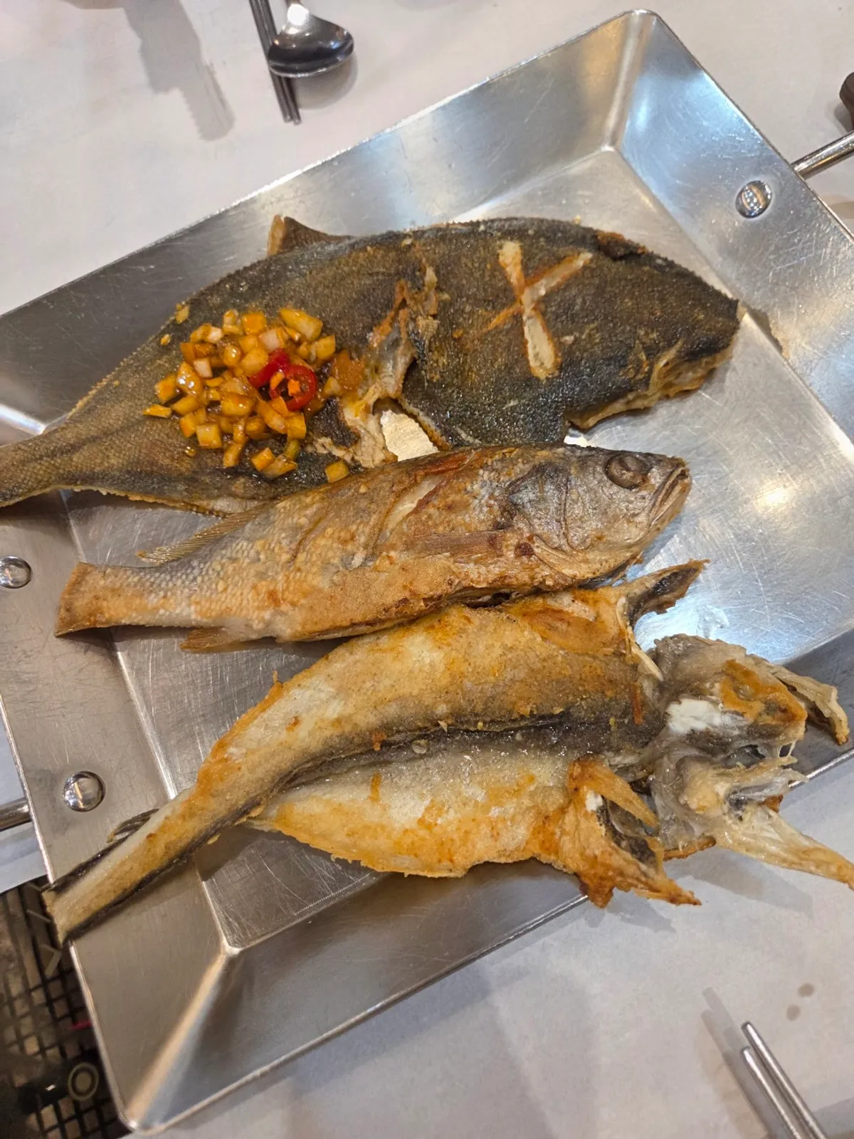 Charcoal bulgogi and seasonal grilled fish set for two, fully laid out