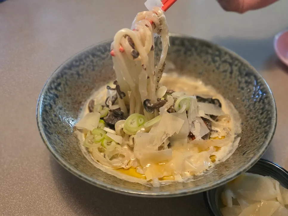 Chewy noodles in perilla cream udon