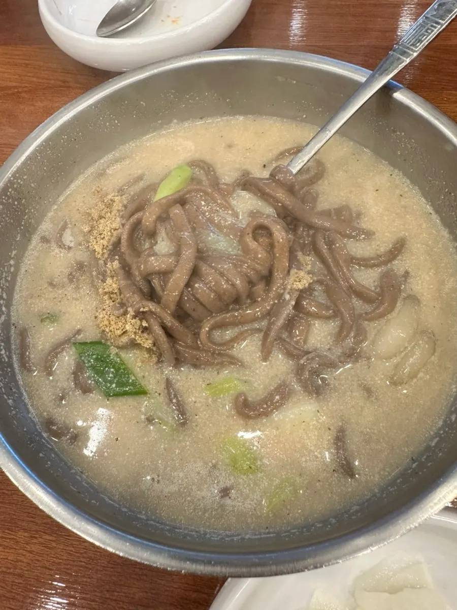 Perilla buckwheat kalguksu with ongsimi dumplings