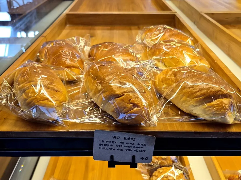 Display case with assorted breads at Pine Terrace