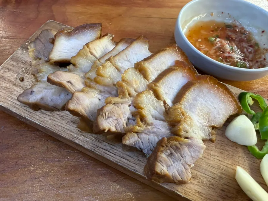 Dombe pork and rice shared with a child