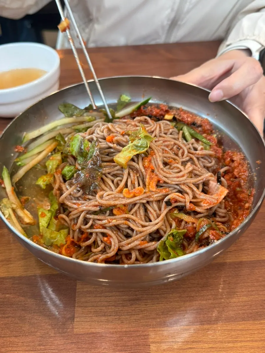 Bibim makguksu noodles mixed with the seasoning sauce