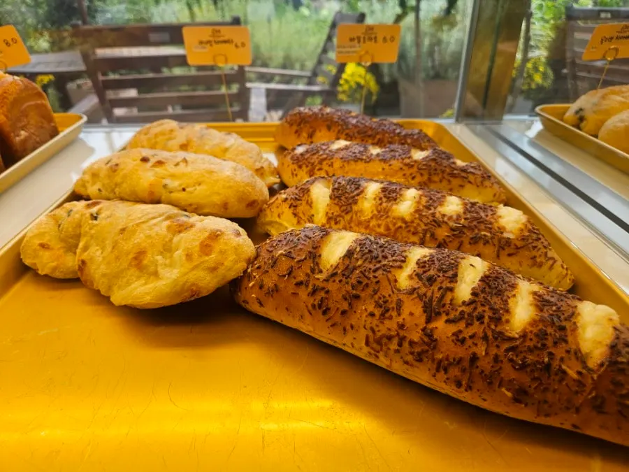 Side view of the bread display at Baedagol Bakery House