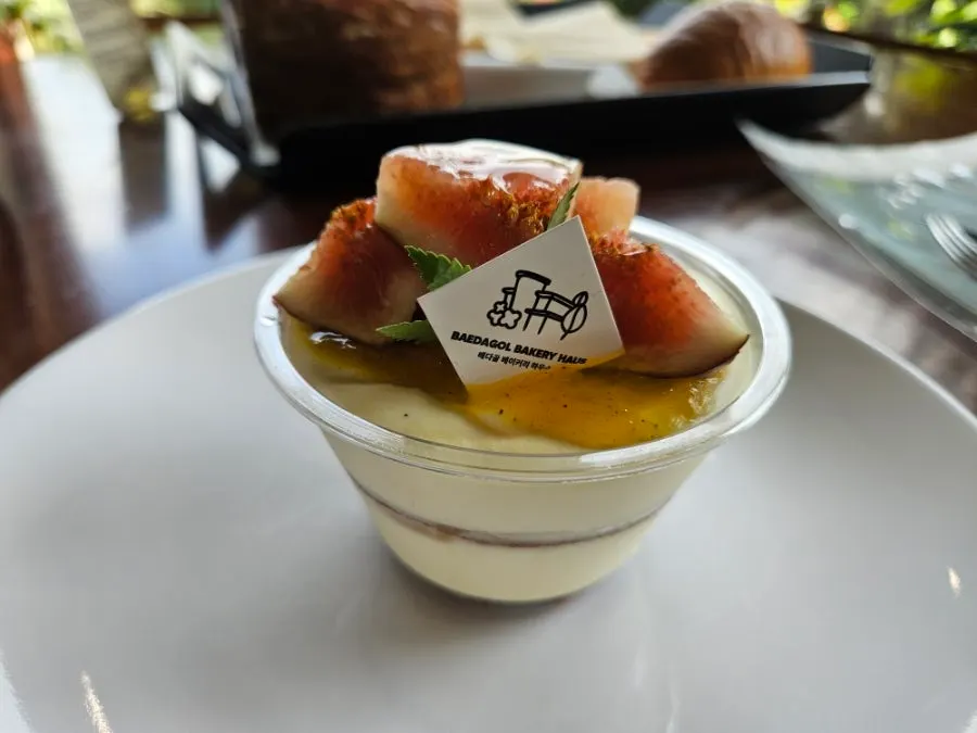 Fresh fruit mascarpone cake topped with fig
