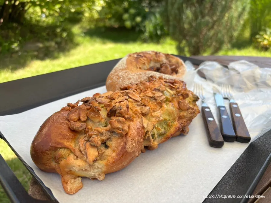 Walnut sticky bread and campagne on a plate