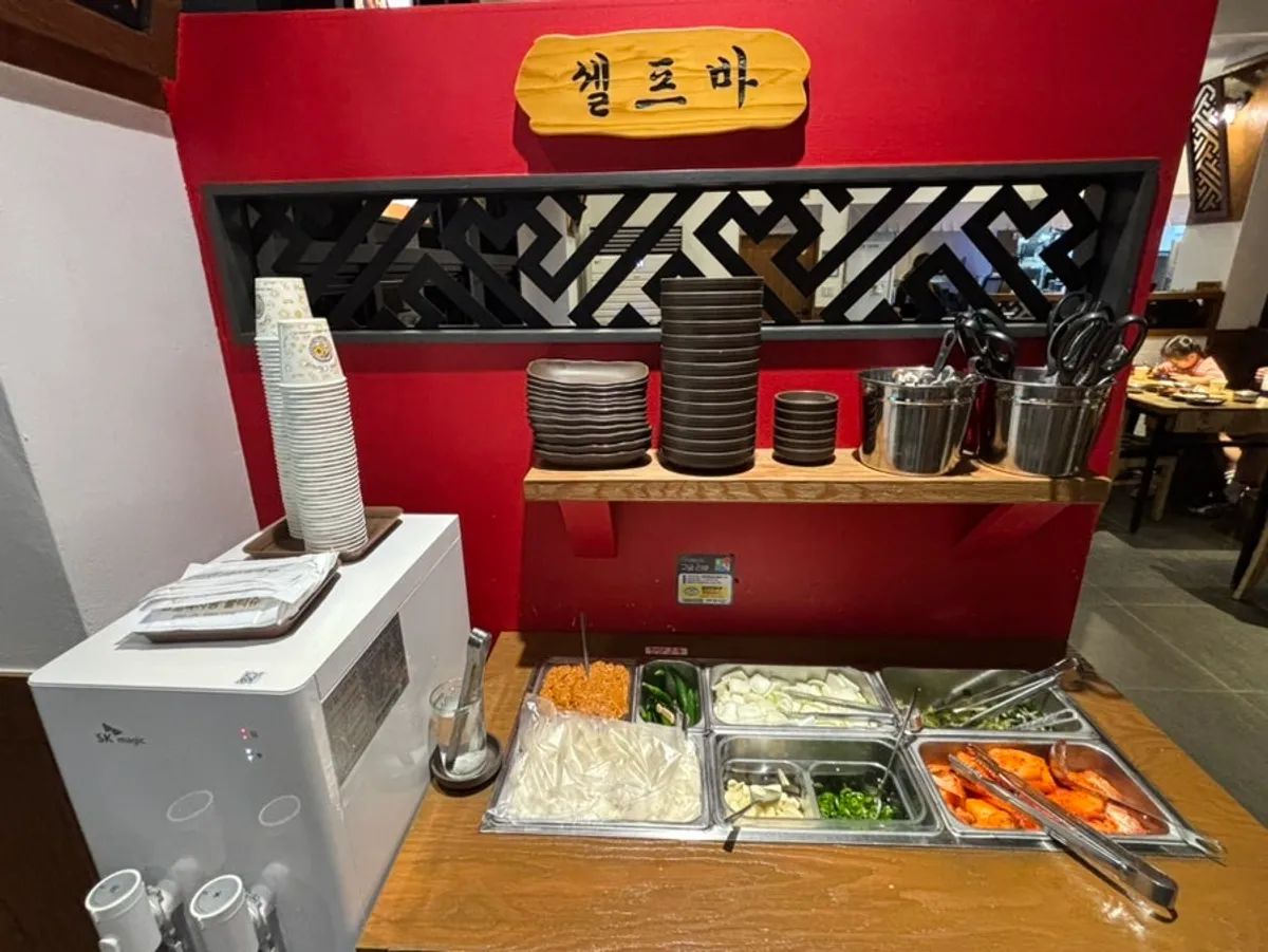 Self-serve bar with kimchi and diced radish kimchi