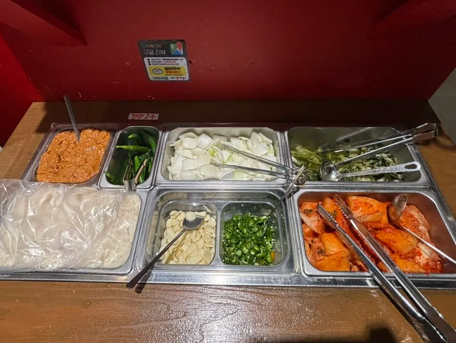 Self-serve bar with thin noodles for the soup