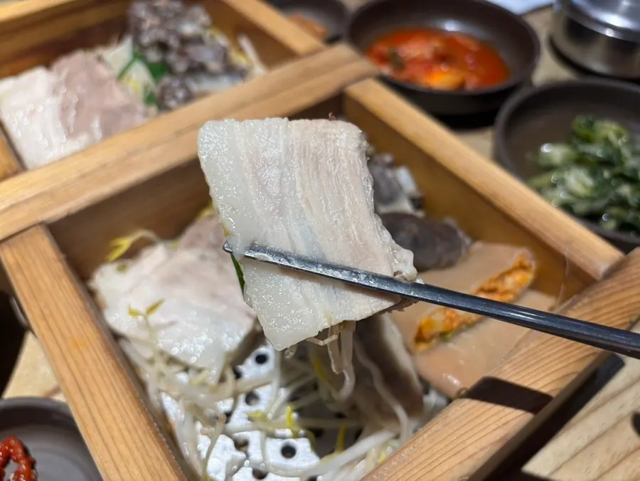 Hinoki steamer holding the mixed platter