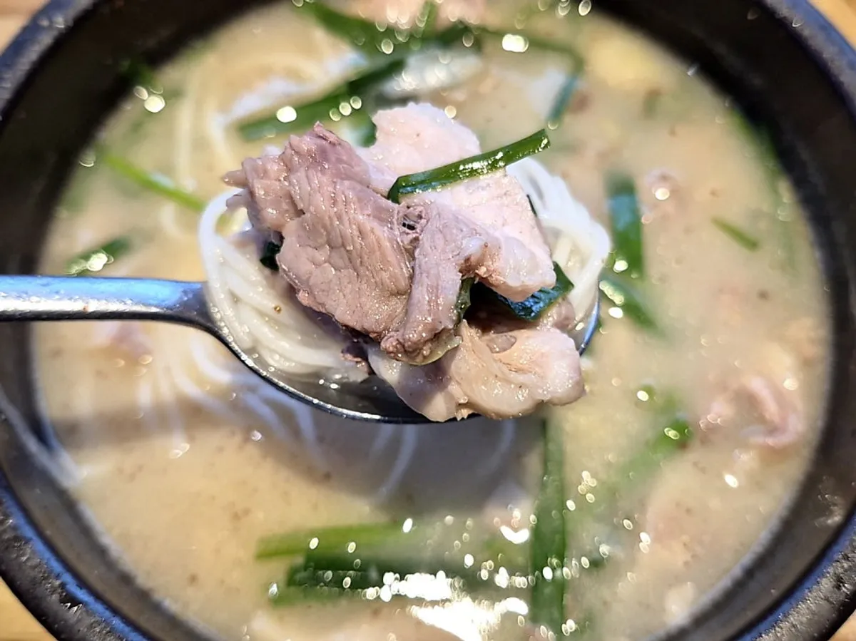 Sundae soup served in a stone bowl
