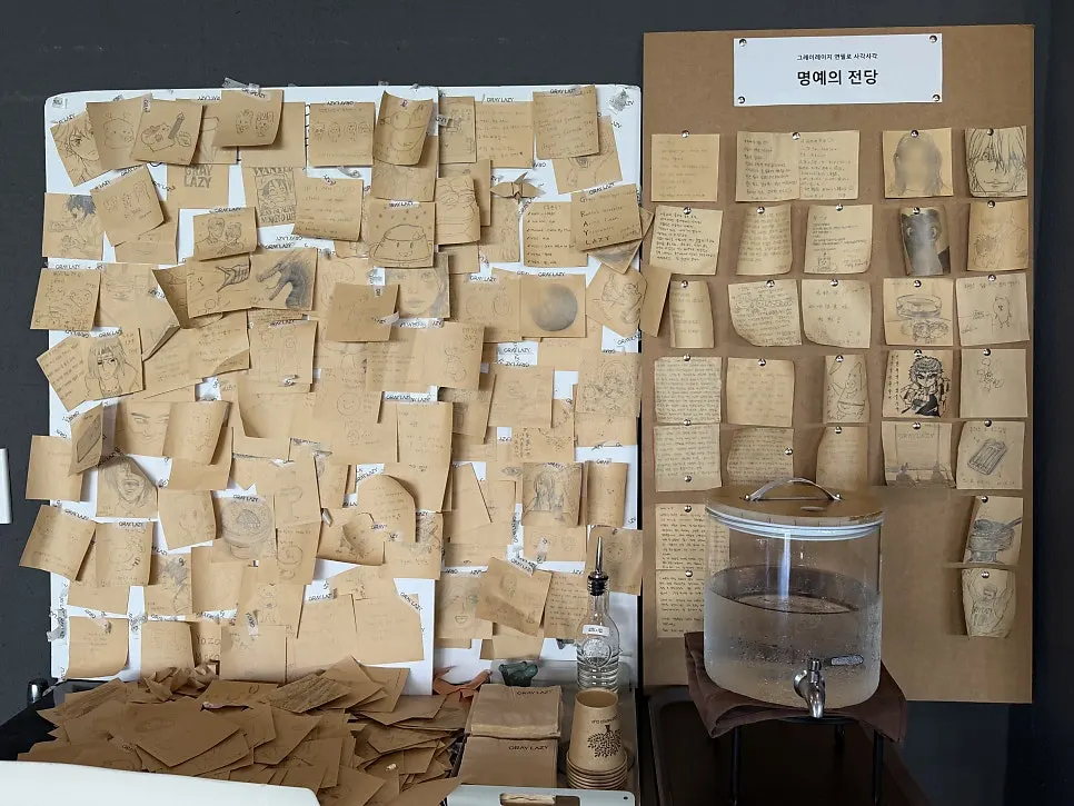 Corner of the café with customer notes and drawings