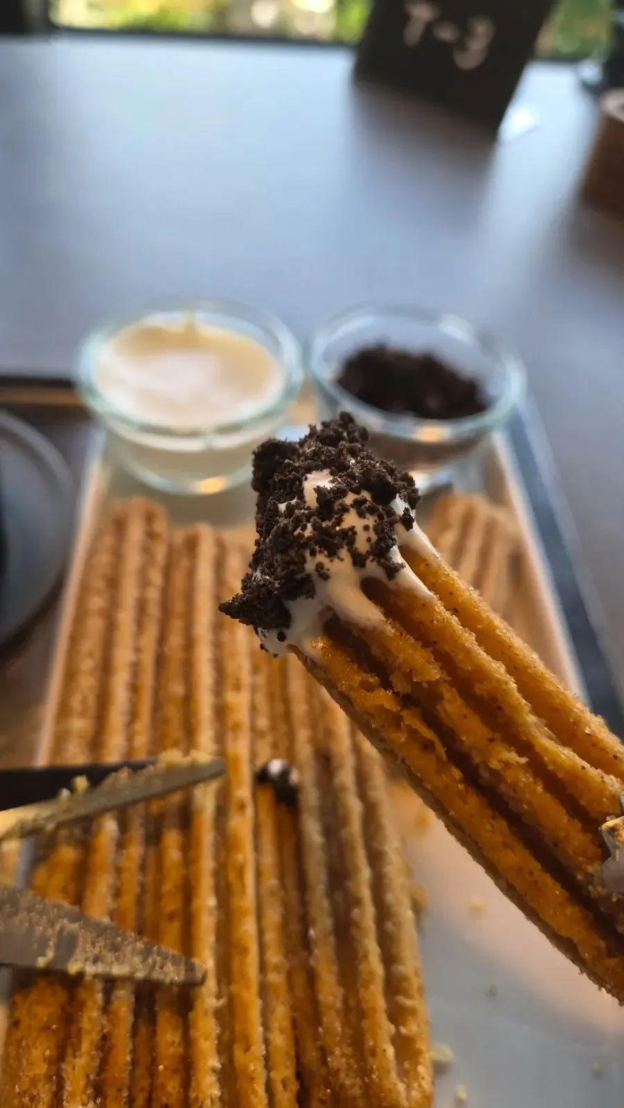 Americano and freshly fried churros at GRAY LAZY