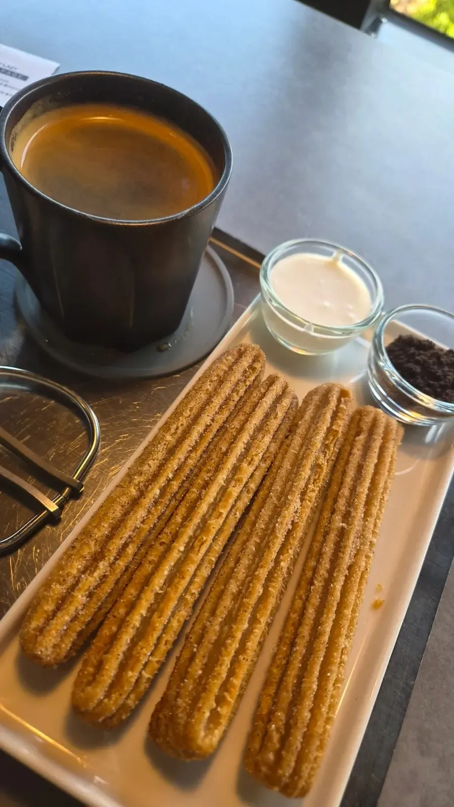 Four churros fried fresh right after ordering