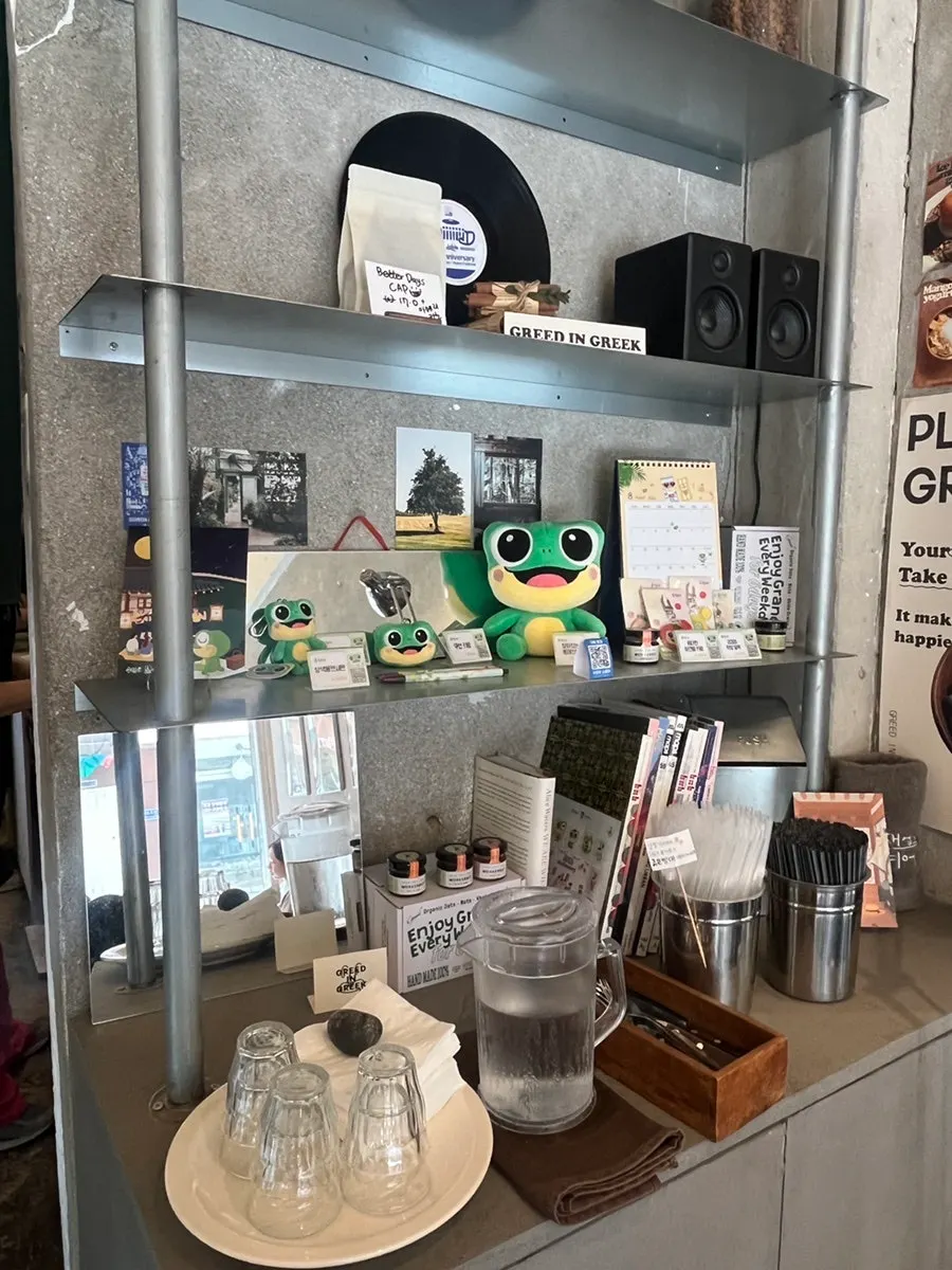 Greek yogurt displayed by size at the counter