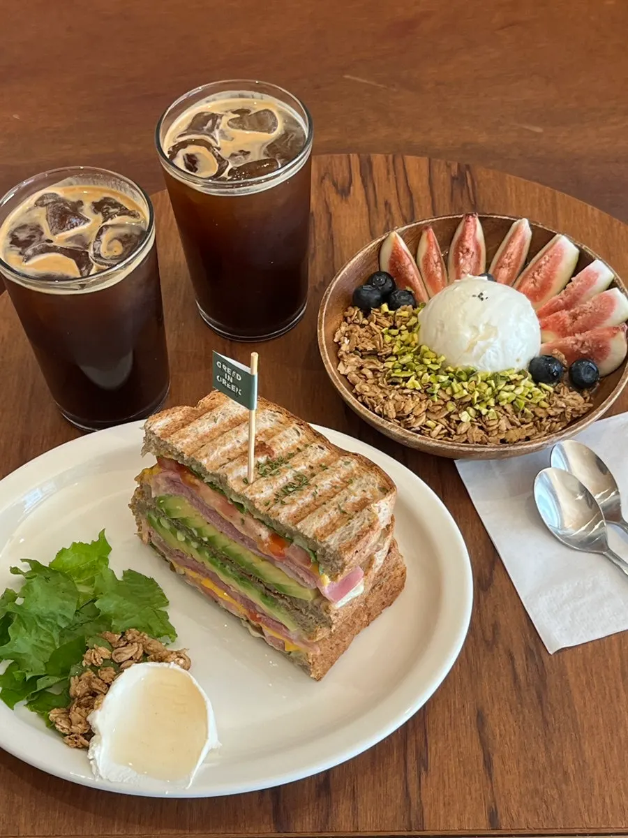 Brunch spread with an americano served alongside