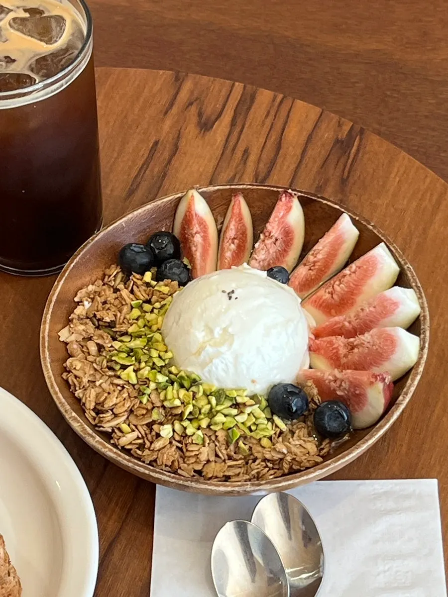 Greek yogurt topped with fig and granola