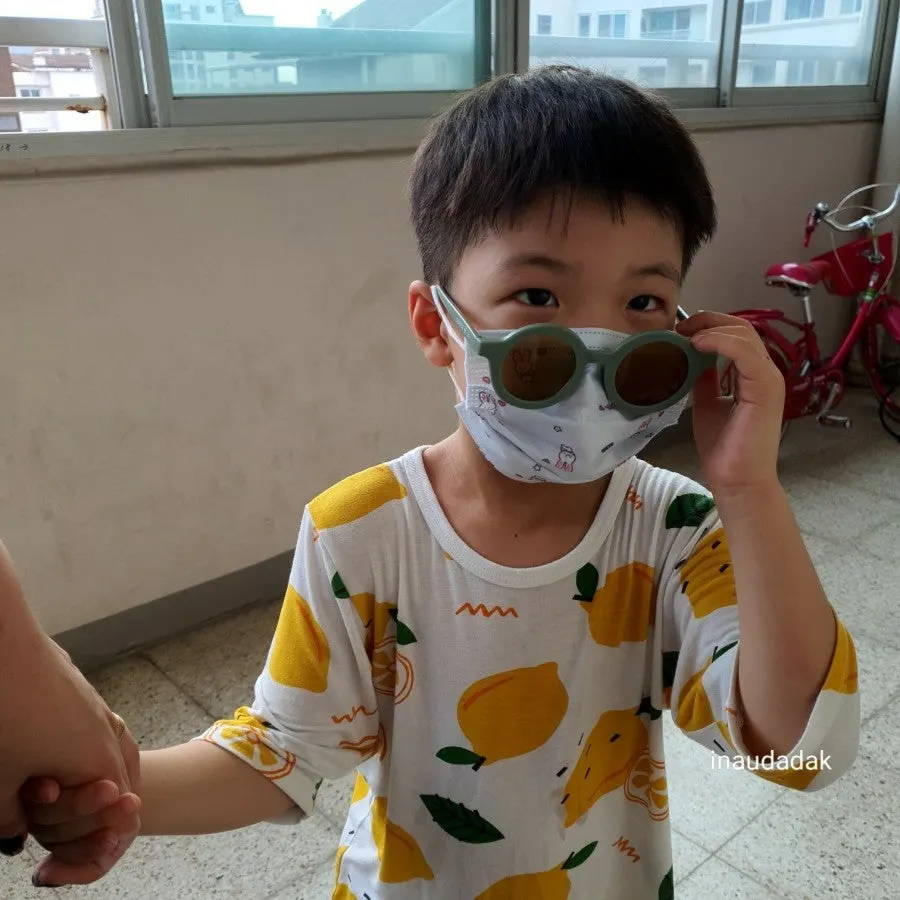 Playful child wearing sunglasses