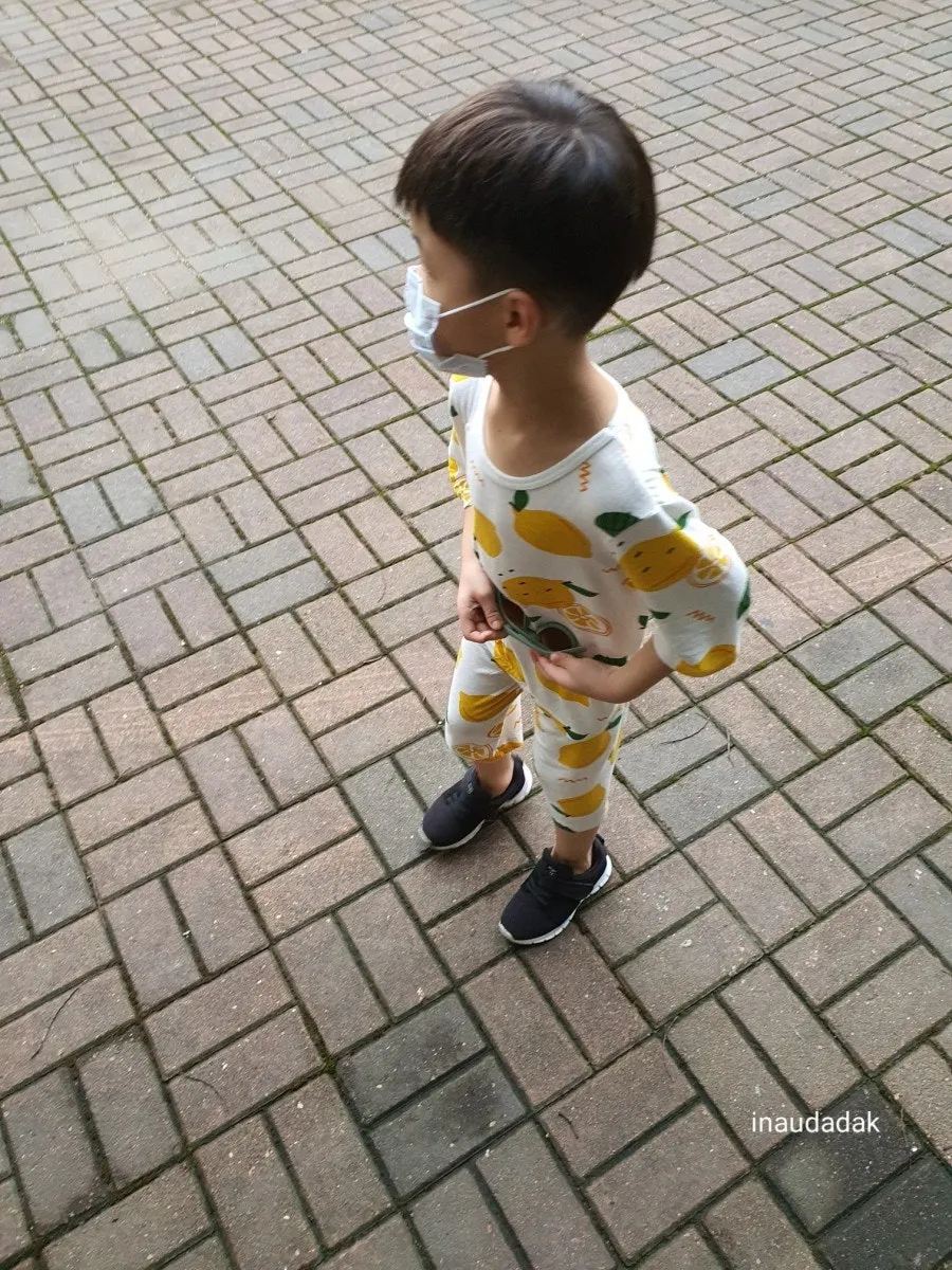 Child wearing UV400 sunglasses