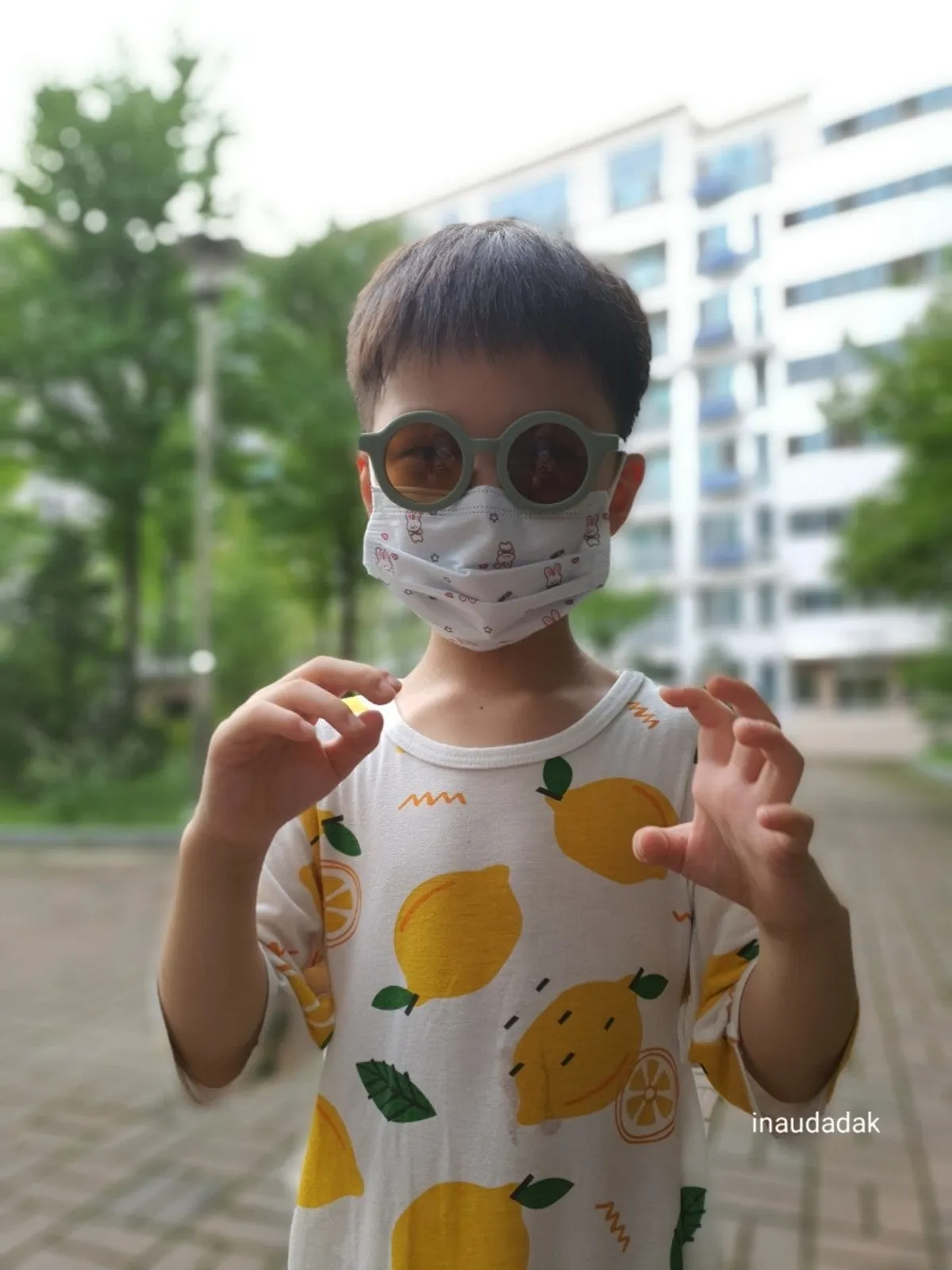 Affectionate child wearing sunglasses