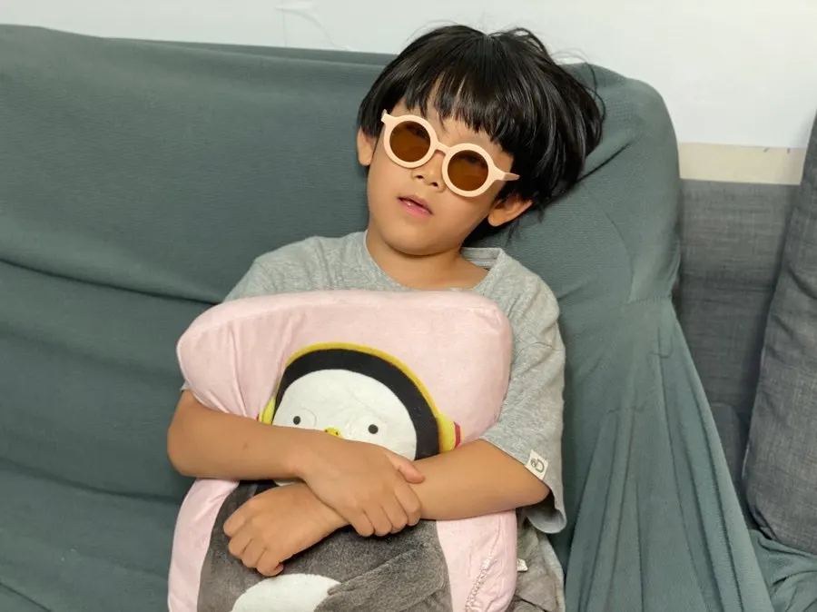 Child wearing sunglasses