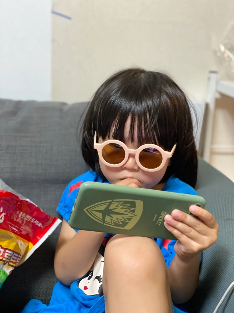 View through toddler sunglasses lenses