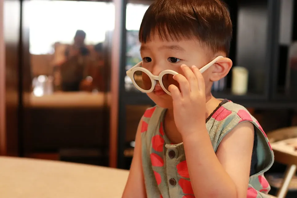 Toddler sunglasses with a variety of outfits
