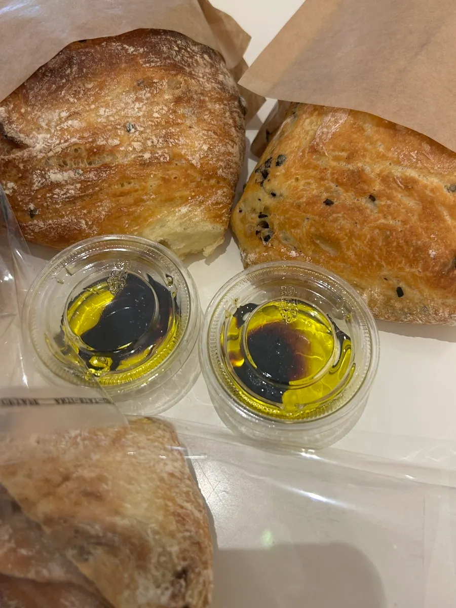 Cross-section of truffle balsamic olive ciabatta with black olives
