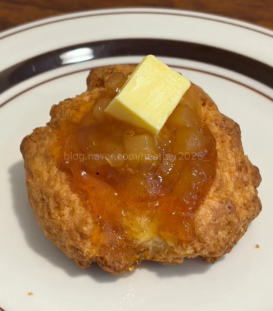 Apple cinnamon jam scone topped with apple jam