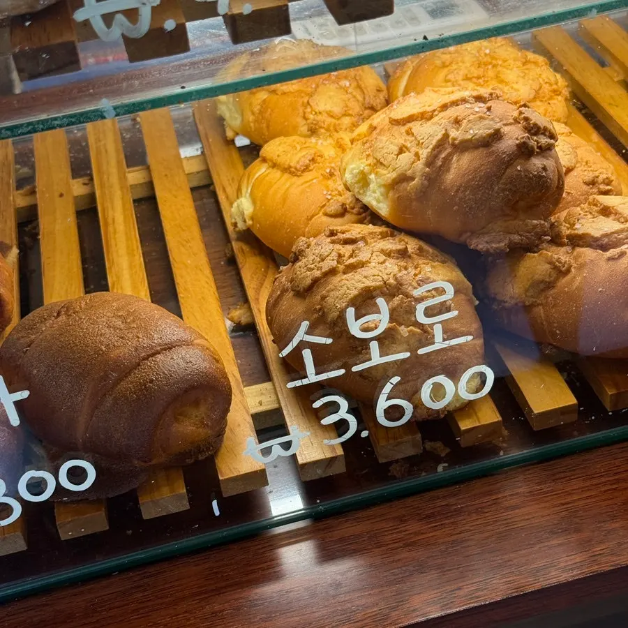 Various bakery items displayed by type at Grid Cafe