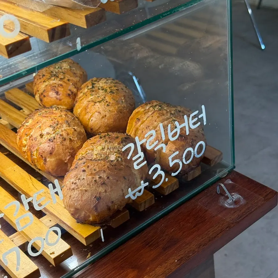 Wide view of the bread display at Grid Cafe