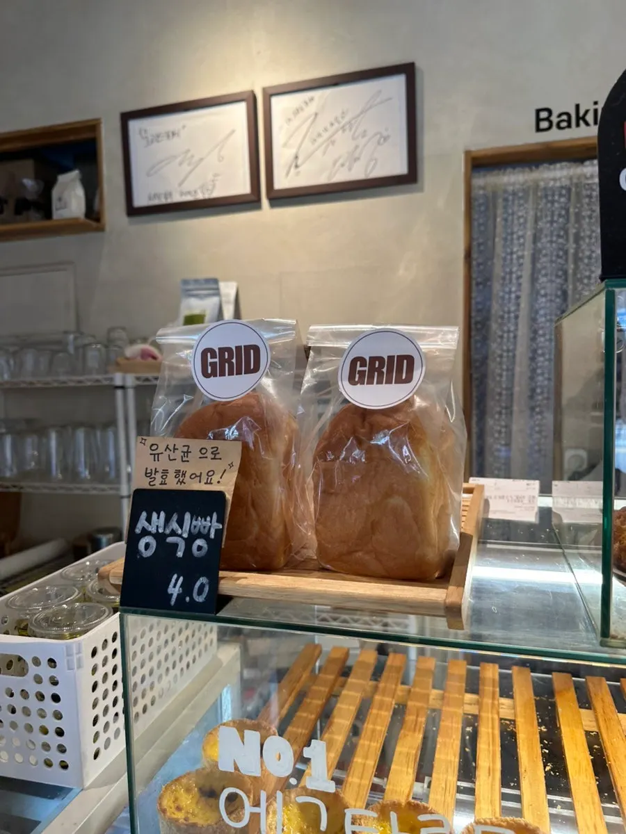 Shelves filled with various breads