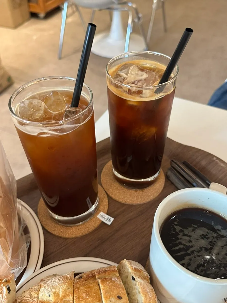 Iced coffee enjoyed alongside the bread
